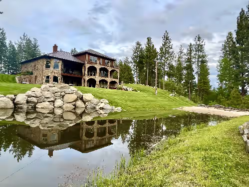 Riverfront home with indoor pool, pond, and the comforts of a first class resort