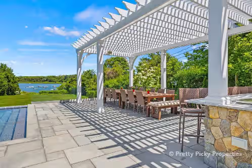 Great views and plenty of seating for a meal under the pergola at "Second Wind"