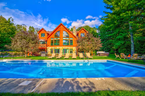 Most Luxurious Log Estate—10 BR's, Pool, Hot Tub, Total Privacy & Lake Access!