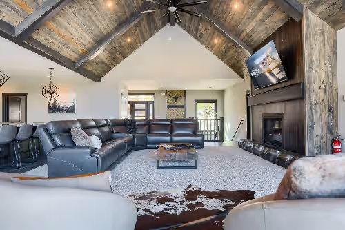 Living area at 6400+ Sq. Ft. Beautiful New Lodge in Powder House Pass w/ Comm. Pool Access