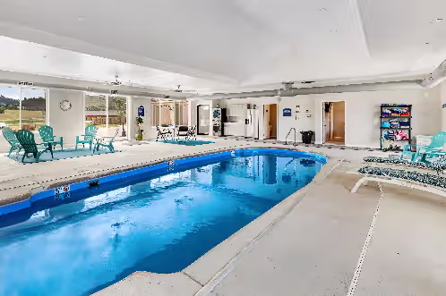 Deluxe spacious home w/private indoor pool, 2 hot tubs, game room, fireplaces